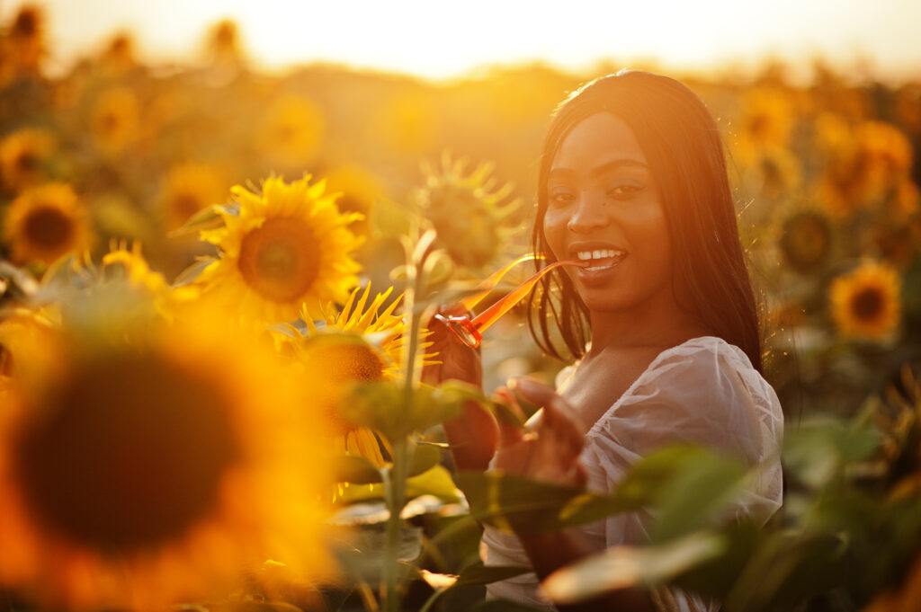Pretty Young Black Woman Wear Summer Dress Pose In A Sunflower F
